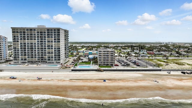 2043 S Atlantic Ave Unit 520, Daytona Beach, FL 32118 - drone / aerial view of a nearby body of water and a pool area