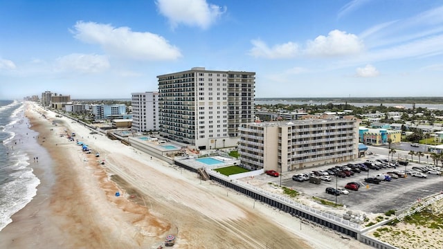 2043 S Atlantic Ave Unit 520, Daytona Beach, FL 32118 - drone / aerial view of waterfront with a beach and apartment complex / building