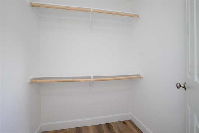 3117 Pine Tree Dr, Edgewater, FL 32141 - spacious closet featuring wood finished floors