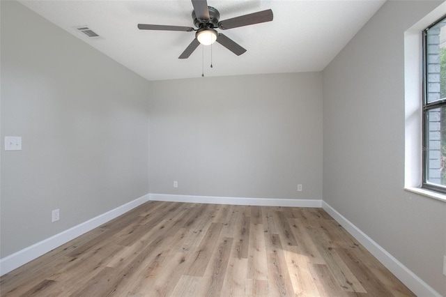 3117 Pine Tree Dr, Edgewater, FL 32141 - spare room featuring ceiling fan and light wood-type flooring