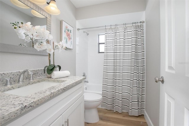 3117 Pine Tree Dr, Edgewater, FL 32141 - bathroom featuring wood finished floors, vanity, and shower / bath combo