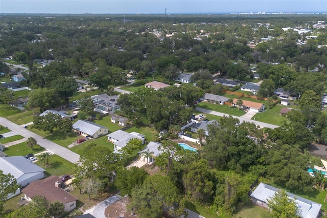 3117 Pine Tree Dr, Edgewater, FL 32141 - aerial view of property and surrounding area featuring nearby suburban area