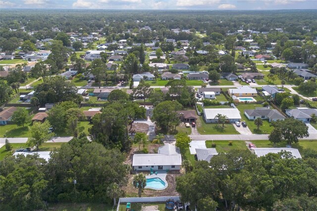 3117 Pine Tree Dr, Edgewater, FL 32141 - aerial view of property's location with nearby suburban area