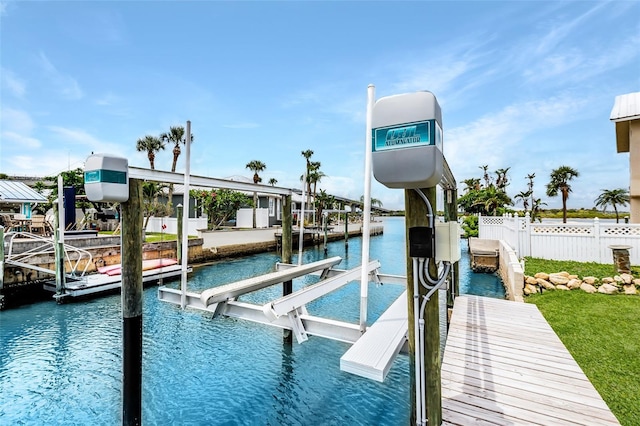 10 Venetian Cir, Port Orange, FL 32127 - dock with boat lift and a water view