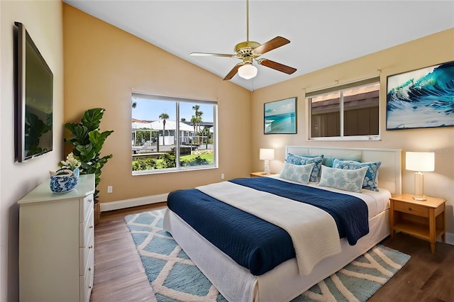 10 Venetian Cir, Port Orange, FL 32127 - bedroom with wood finished floors, lofted ceiling, and a ceiling fan