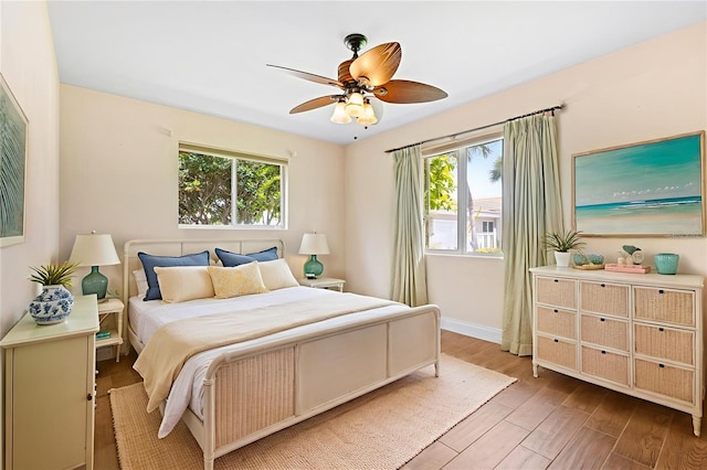 10 Venetian Cir, Port Orange, FL 32127 - bedroom featuring wood finished floors and ceiling fan