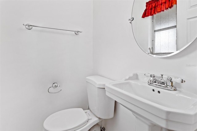 10 Venetian Cir, Port Orange, FL 32127 - half bathroom with toilet and a sink