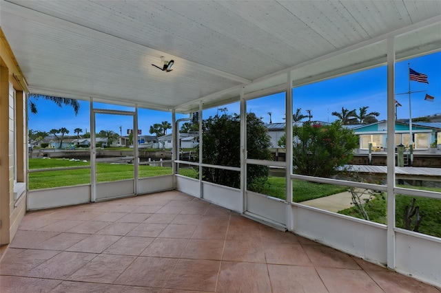 10 Venetian Cir, Port Orange, FL 32127 - unfurnished sunroom featuring a water view