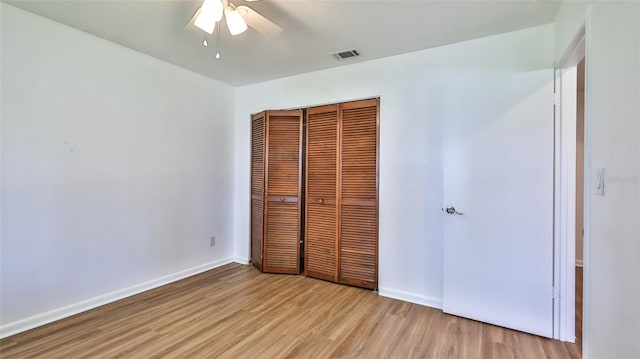 1017 Chippewa Trl, Daytona Beach, FL 32117 - unfurnished bedroom featuring light wood finished floors, a closet, and a ceiling fan