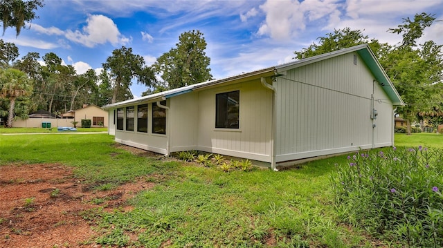 1017 Chippewa Trl, Daytona Beach, FL 32117 - view of side of home featuring a yard