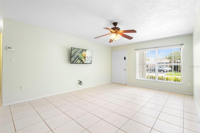 511 Polaris Loop Unit 105, Casselberry, FL 32707 - unfurnished room with a ceiling fan, a textured ceiling, and light tile patterned flooring