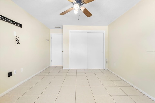 511 Polaris Loop Unit 105, Casselberry, FL 32707 - unfurnished bedroom featuring a closet and ceiling fan