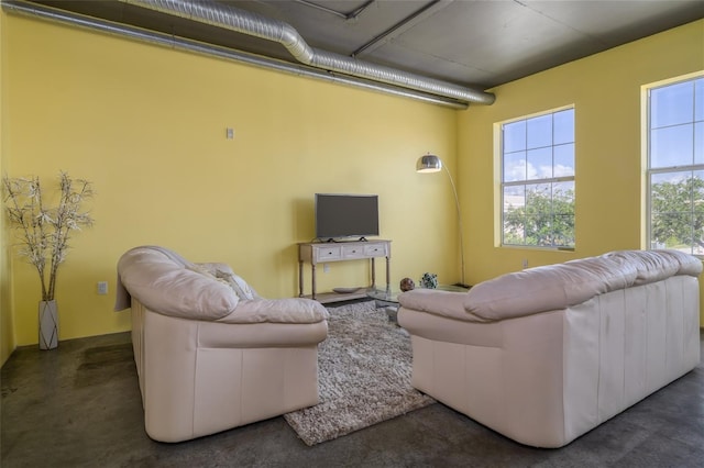 208 Wall St Unit 204, Daytona Beach, FL 32114 - living area with finished concrete floors