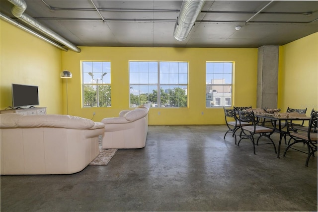 208 Wall St Unit 204, Daytona Beach, FL 32114 - living area featuring concrete flooring