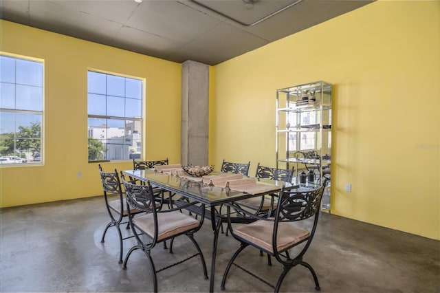 208 Wall St Unit 204, Daytona Beach, FL 32114 - dining room with concrete floors