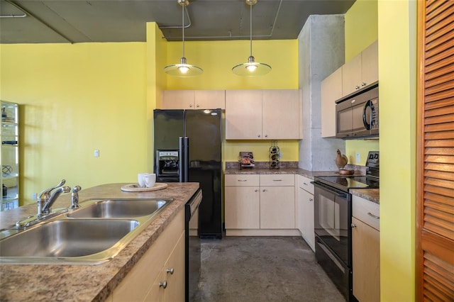 208 Wall St Unit 204, Daytona Beach, FL 32114 - kitchen featuring black appliances, finished concrete flooring, and pendant lighting