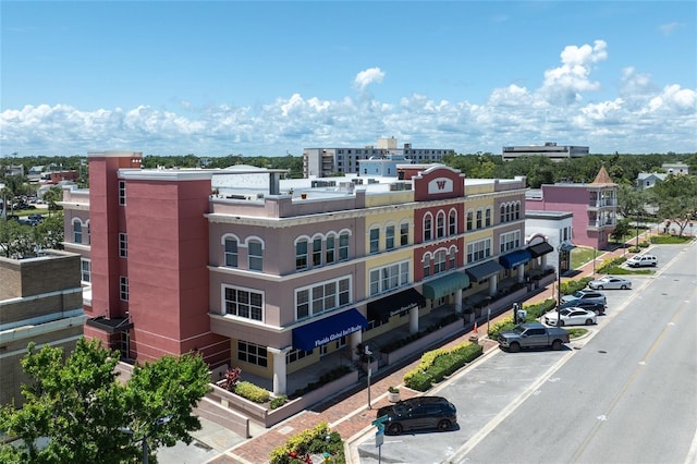 208 Wall St Unit 204, Daytona Beach, FL 32114 - view of building exterior with uncovered parking