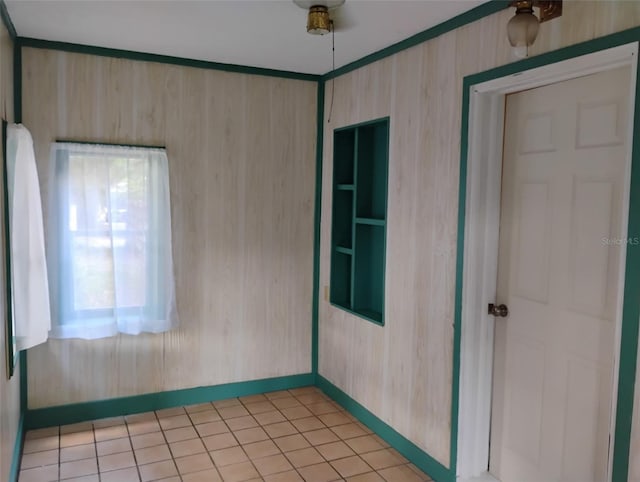 615 Weber Ave, Daytona Beach, FL 32114 - empty room with light tile patterned floors and a ceiling fan