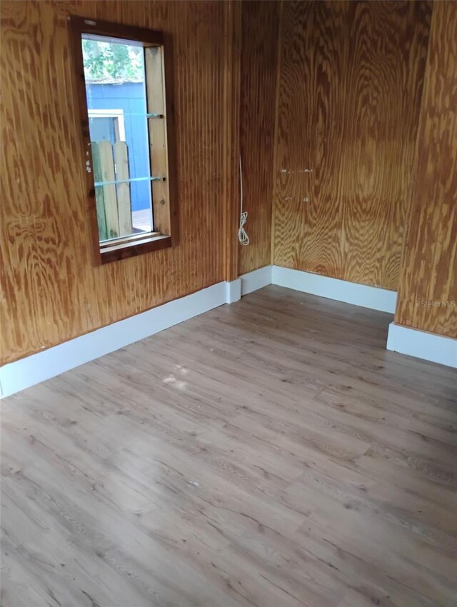 615 Weber Ave, Daytona Beach, FL 32114 - empty room featuring wood finished floors and baseboards