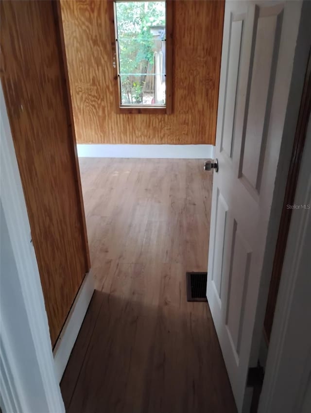 615 Weber Ave, Daytona Beach, FL 32114 - hallway with wood finished floors and baseboards