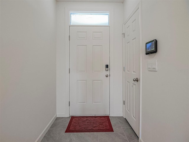 1915 Ganyard Ave SW, Palm Bay, FL 32908 - entryway featuring baseboards and tile patterned floors