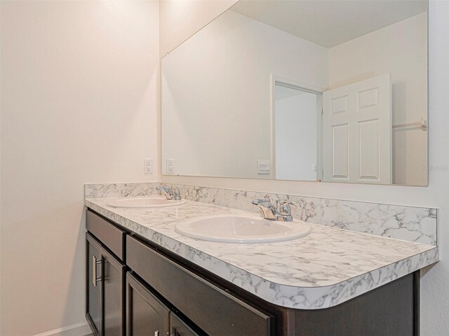 1915 Ganyard Ave SW, Palm Bay, FL 32908 - bathroom featuring double vanity
