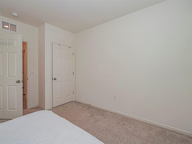 1915 Ganyard Ave SW, Palm Bay, FL 32908 - unfurnished bedroom featuring carpet floors and baseboards