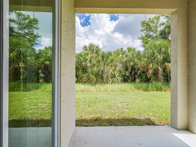 1915 Ganyard Ave SW, Palm Bay, FL 32908 - view of grassy yard with a patio