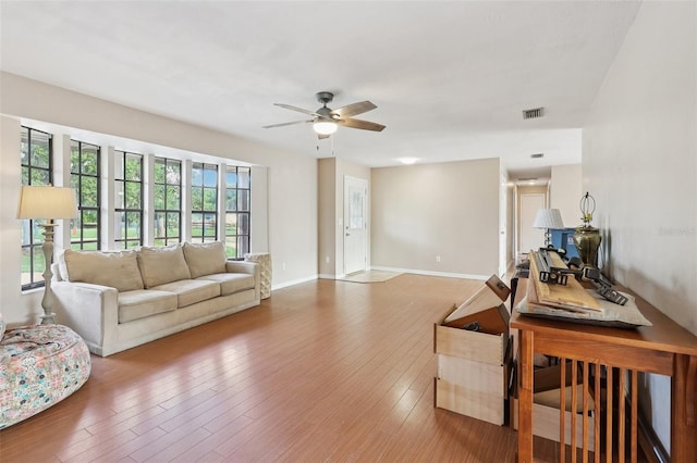5759 Dogwood Rd, Port Orange, FL 32127 - living room with a ceiling fan and wood finished floors