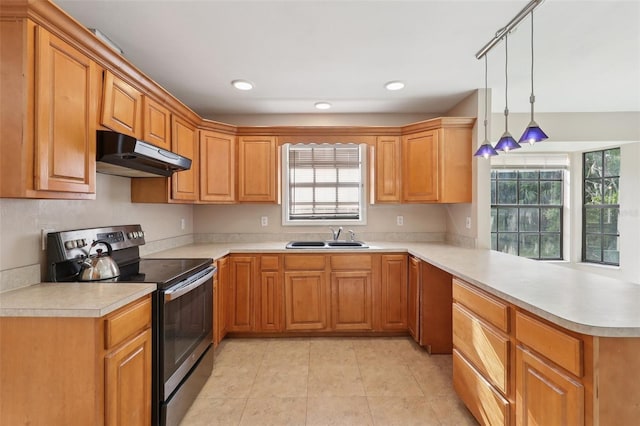 5759 Dogwood Rd, Port Orange, FL 32127 - kitchen with under cabinet range hood, stainless steel range with electric stovetop, light countertops, a peninsula, and light tile patterned floors