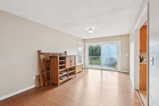 5759 Dogwood Rd, Port Orange, FL 32127 - empty room with wood finished floors and baseboards