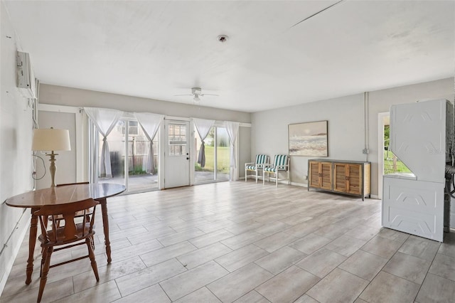 5759 Dogwood Rd, Port Orange, FL 32127 - unfurnished living room with ceiling fan
