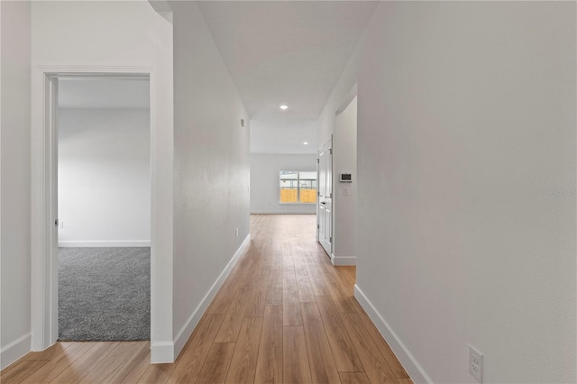 822 W 24th St, Sanford, FL 32771 - hallway featuring light wood finished floors and recessed lighting