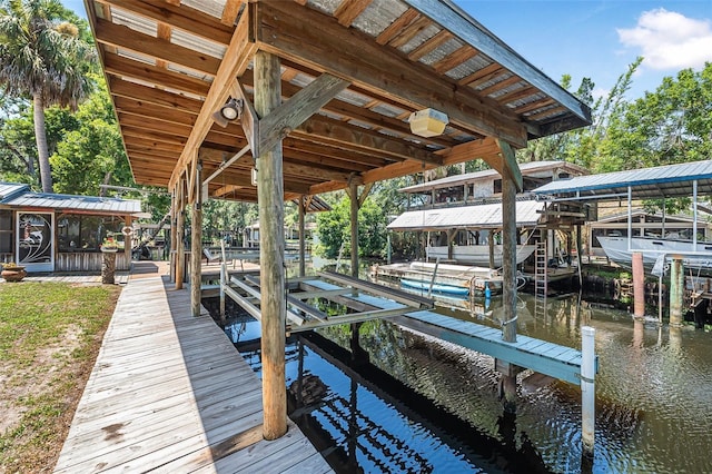 1085 Indigo Rd, Ormond Beach, FL 32174 - dock area with boat lift and a water view