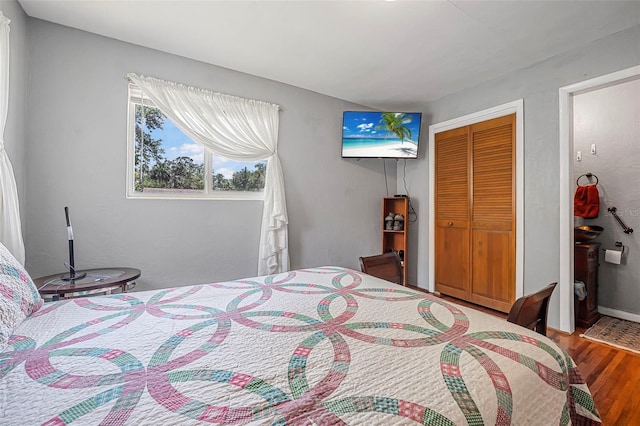 1085 Indigo Rd, Ormond Beach, FL 32174 - bedroom with wood finished floors and a closet