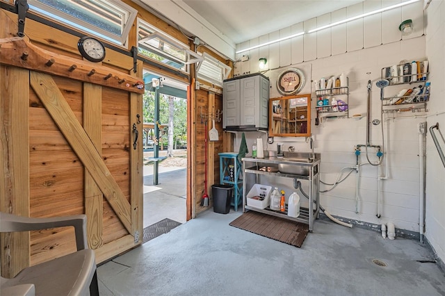 1085 Indigo Rd, Ormond Beach, FL 32174 - miscellaneous room featuring concrete floors