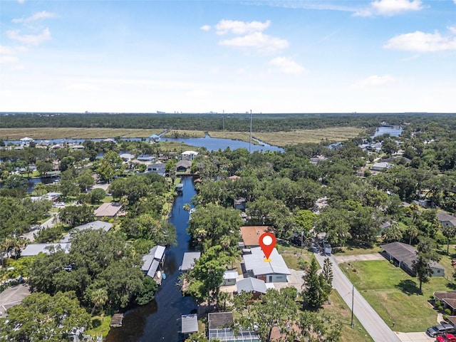 1085 Indigo Rd, Ormond Beach, FL 32174 - aerial view of property and surrounding area with a large body of water and nearby suburban area
