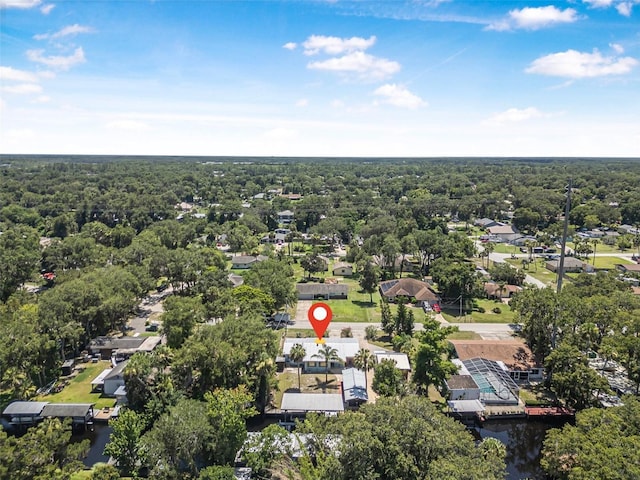 1085 Indigo Rd, Ormond Beach, FL 32174 - aerial perspective of suburban area featuring a forest