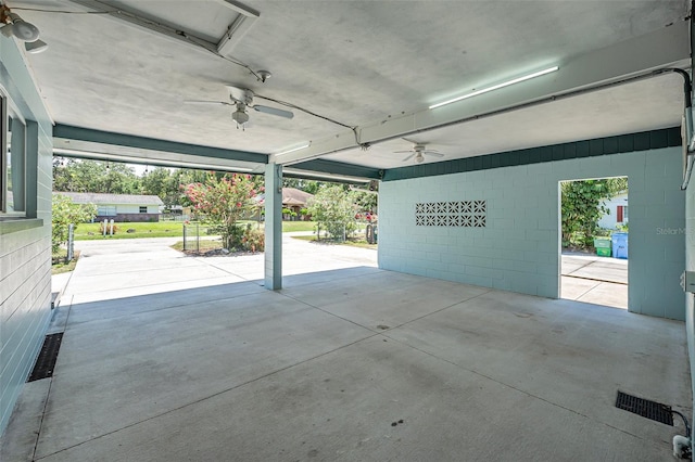 1085 Indigo Rd, Ormond Beach, FL 32174 - garage with ceiling fan