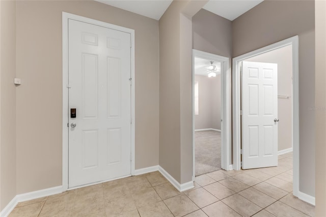 32 Abacus Ave, Ormond Beach, FL 32174 - foyer featuring light tile patterned floors and baseboards