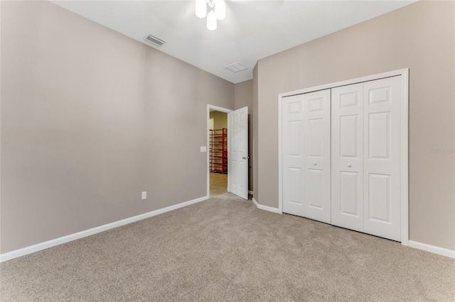 32 Abacus Ave, Ormond Beach, FL 32174 - unfurnished bedroom with carpet floors, a closet, and a ceiling fan