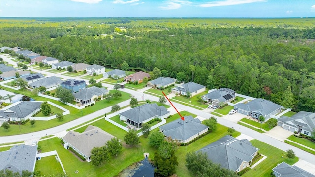 32 Abacus Ave, Ormond Beach, FL 32174 - aerial view of residential area featuring a heavily wooded area