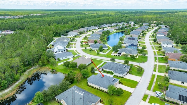 32 Abacus Ave, Ormond Beach, FL 32174 - aerial view of residential area with a forest and a nearby body of water
