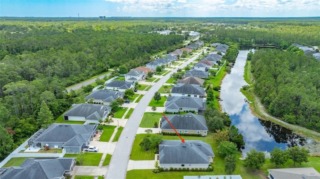 32 Abacus Ave, Ormond Beach, FL 32174 - aerial perspective of suburban area featuring a heavily wooded area and a large body of water