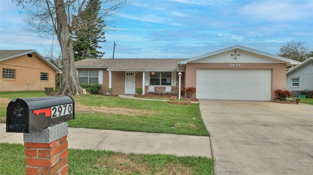 2970 Lantern Dr, South Daytona, FL 32119 - single story home with a front lawn, an attached garage, and driveway
