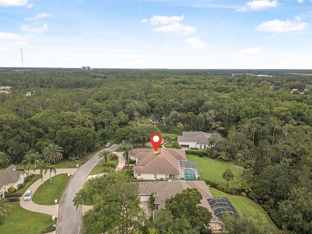 19 Tomoka Cove Way, Ormond Beach, FL 32174 - aerial view of property and surrounding area with a forest