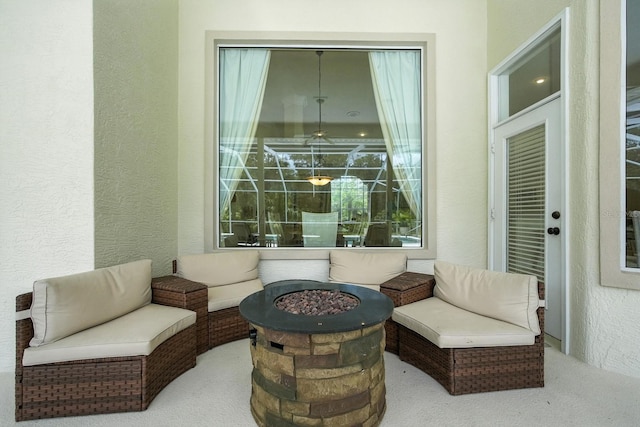 19 Tomoka Cove Way, Ormond Beach, FL 32174 - view of patio featuring an outdoor fire pit