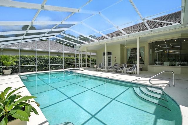 19 Tomoka Cove Way, Ormond Beach, FL 32174 - view of swimming pool with a patio, ceiling fan, and glass enclosure