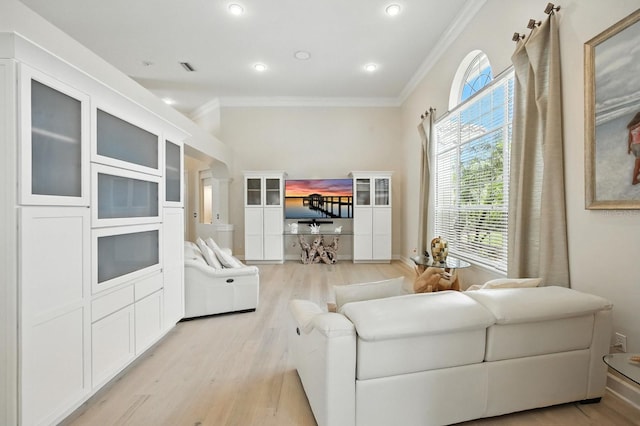 19 Tomoka Cove Way, Ormond Beach, FL 32174 - living room with crown molding, light wood-style floors, and recessed lighting