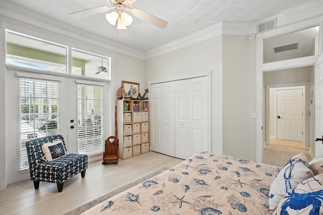 19 Tomoka Cove Way, Ormond Beach, FL 32174 - bedroom featuring wood finished floors, ornamental molding, access to exterior, ceiling fan, and a closet